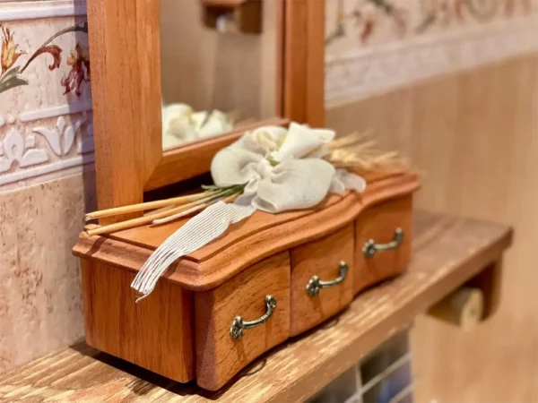 Detalle de tocador de cedro con flores secas encima